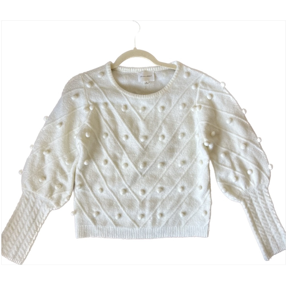 Puff sleeve pom pom white sweater from Anthropologie cozy pullover